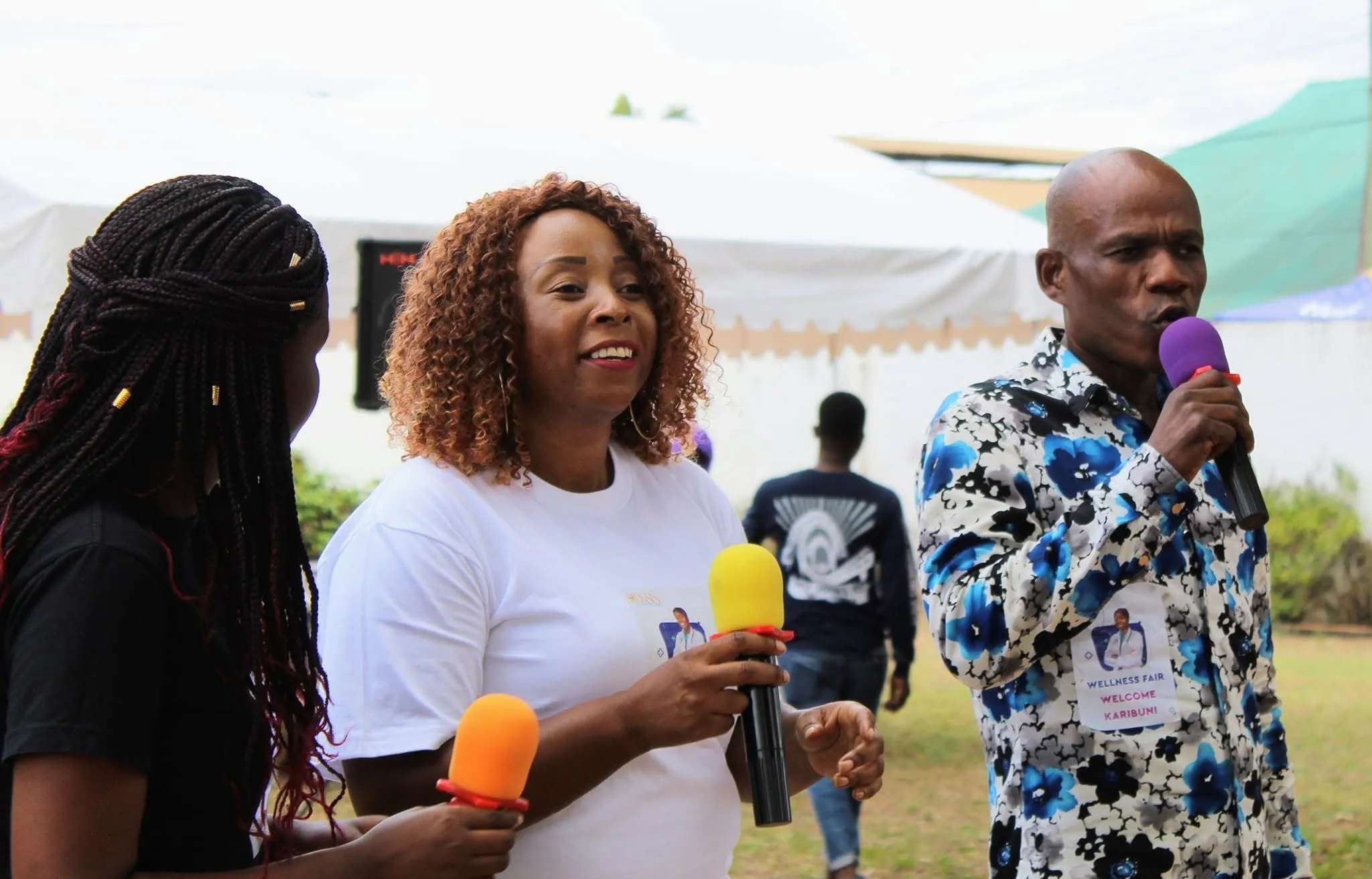 Church members welcoming the community at an outreach event